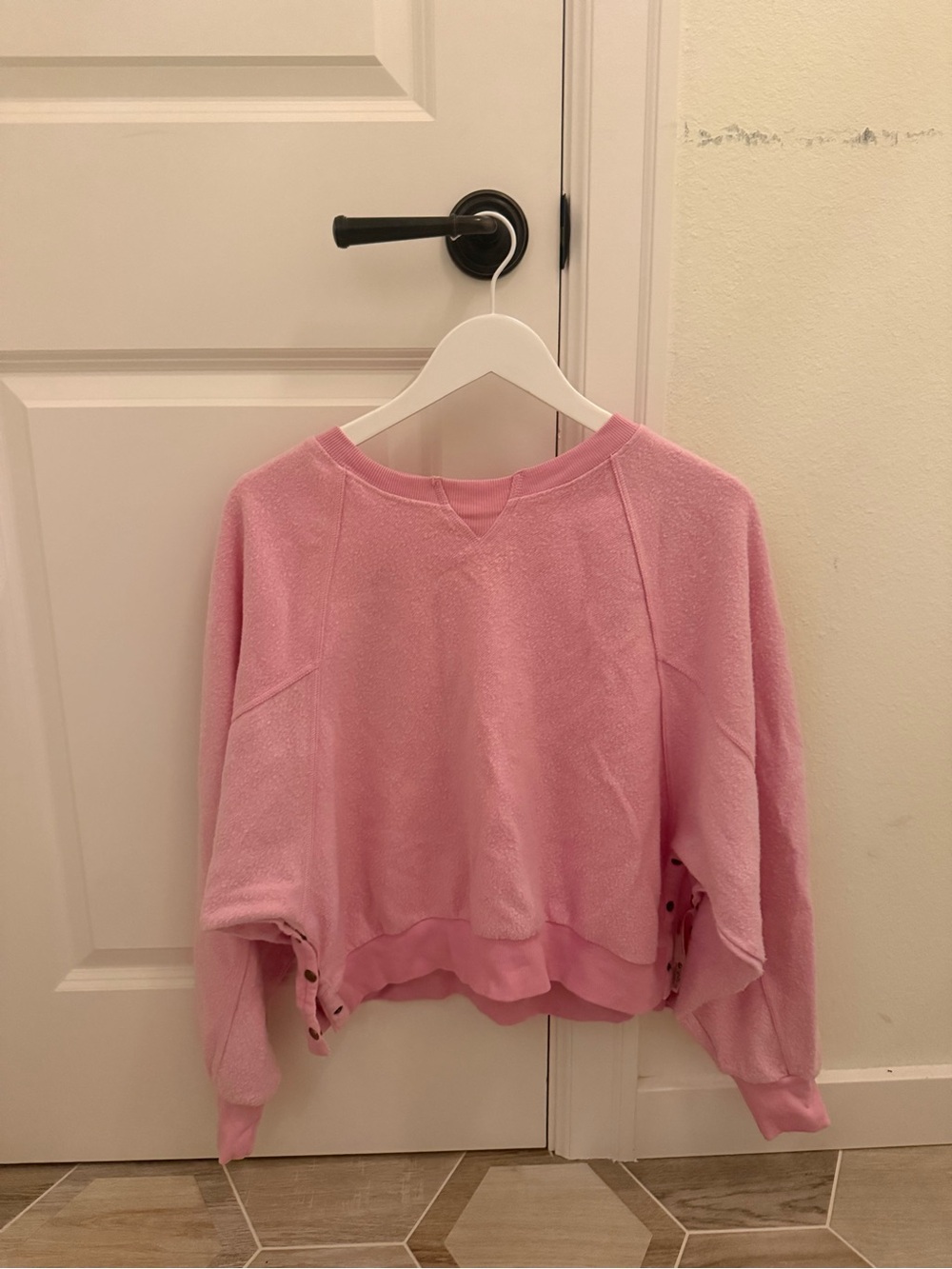 Cozy Pink Crewneck Sweater with Side Button Detail
